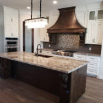 Granite Countertops with tile backsplash - Bianco Antico Granite